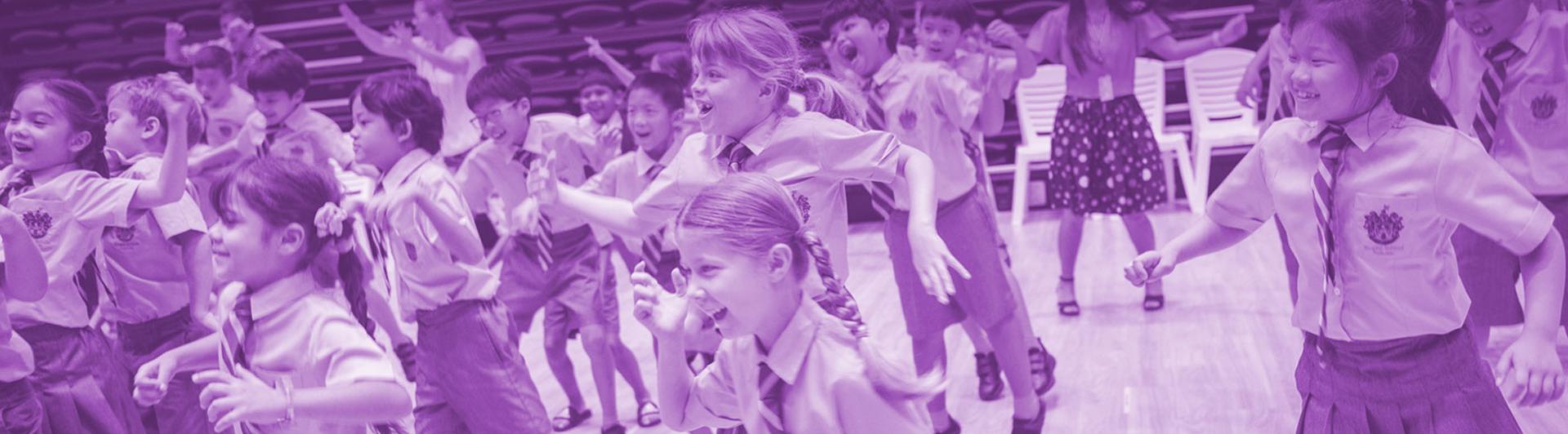 Purple and white image of kids dancing