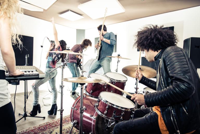 Rock band playing instruments